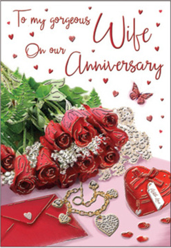 This anniversary card design feels like a private love letter laid out on a sunlit table in a quiet corner of Cheam, perhaps near Nonsuch Park after an afternoon stroll. At its heart sits a small but luxurious posy of crimson red roses, each bloom full and velvety, their swirling petals forming tight rosettes that seem almost touchable. Their rich colour is deep and romantic, softened by sprigs of bright, fresh greenery that curl gently around the blossoms, echoing the lushness of a hand-tied bouquet. Around the flowers, sentimental details have been arranged with care: a neat envelope, inviting thoughts of a carefully chosen anniversary message; a petite heart-shaped box in a vivid red tone, reminiscent of a cherished keepsake; and a piece of jewellery, perhaps a necklace, catching the light in delicate flashes of gold or silver. Scattered tiny hearts glimmer across the backdrop, creating a whimsical trail of romance, while a solitary butterfly motif appears to hover nearby, symbolising transformation and lasting affection. The background shimmers with soft blush and cream hues, giving the impression of polished paper or satin fabric under gentle daylight. Everything is composed in a way that feels intentional and intimate, as though an experienced local florist had arranged a still life to celebrate the milestones of couples across Cheam and its tree-lined avenues. The overall mood is warm and reflective, perfectly suited to expressing enduring love, gratitude, and the quiet joy of another shared anniversary.