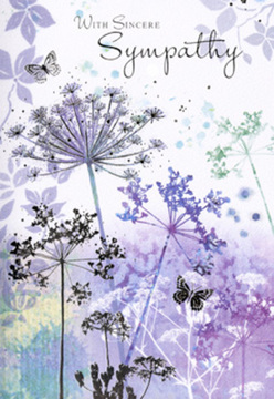 The design of this sympathy card unfolds as a gentle, nature-inspired painting, reminiscent of the soft, early light that settles over Cheam's tree-lined avenues. Fine, lace-like flower heads, shaped like airy umbels, rise from slender stems washed in cool purples, violets, and dusky blues. At their base, a low haze of silvery green and muted lavender suggests a meadow just stirring awake, the colours blending and fading as though seen through morning mist near Nonsuch Park. The petals and foliage are rendered with almost transparent touches of paint, leaving pauses of white that add breath and space, so the arrangement feels weightless and serene. Among the blossoms, butterflies drift quietly, their wings gauzy and pale, as if caught for a second in a gentle breeze that brushes along Malden Road. They are not bold or sharply defined; instead, they whisper of continuity and the subtle presence of loved ones who remain with us in memory. The overall palette is cool yet consoling, every hue softened to avoid overwhelming the senses. Light seems to come from nowhere in particular, bathing the entire scene in a respectful, reflective glow, like a room set aside for remembrance. This is the kind of card we often reach for at Cheam Florist when families seek something understated yet meaningful, an image that supports simple words of condolence. It looks and feels like a quiet embrace on a difficult day, a tender, visual poem that acknowledges grief while gently suggesting peace.